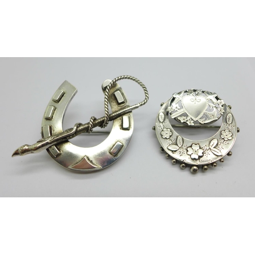 972 - A hallmarked Victorian silver brooch and a large horseshoe brooch