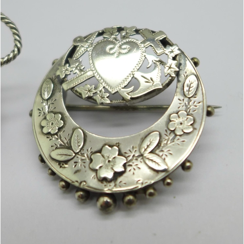 972 - A hallmarked Victorian silver brooch and a large horseshoe brooch