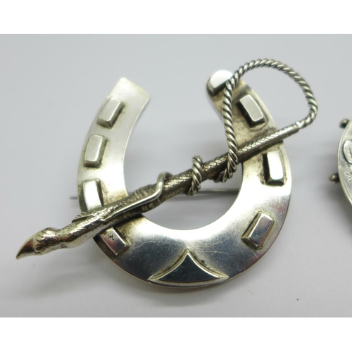 972 - A hallmarked Victorian silver brooch and a large horseshoe brooch