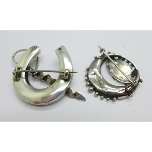 972 - A hallmarked Victorian silver brooch and a large horseshoe brooch