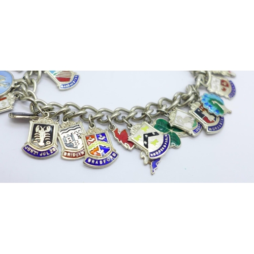 986 - A silver charm bracelet, 45g