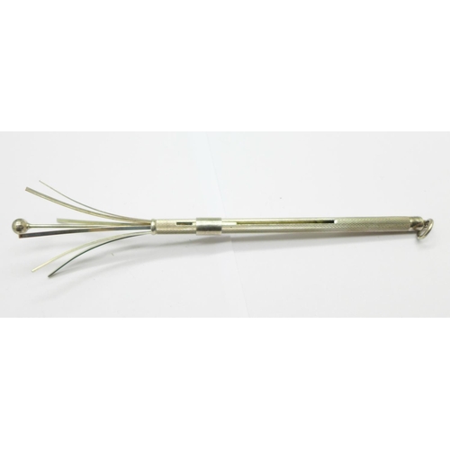 990 - A silver cocktail swizzle stick