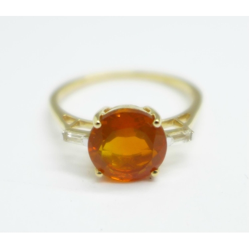 993 - A 9ct gold, orange American fire opal and white zircon ring, with certificate, 2.5g, U