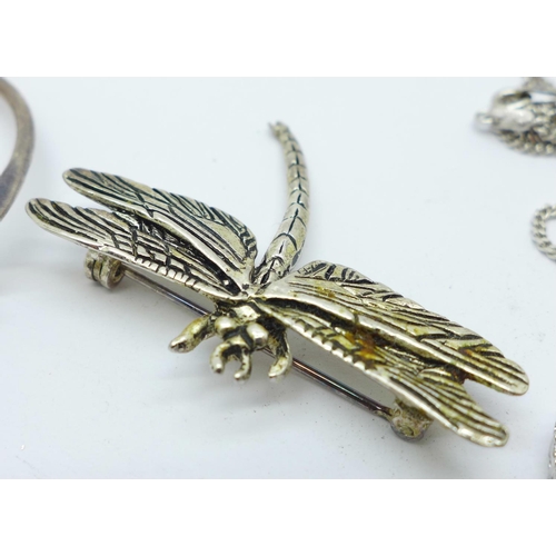 997 - An 800 silver and stone set dragonfly brooch, one other dragonfly brooch, a silver bangle, two silve... 