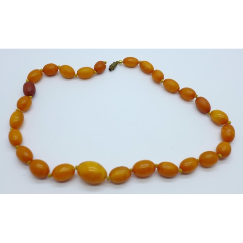 998 - A set of butterscotch amber coloured beads, a/f