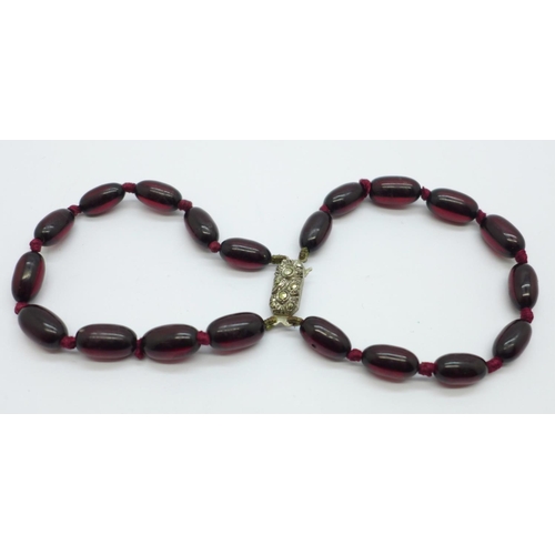 999 - A sherry amber coloured double string bracelet