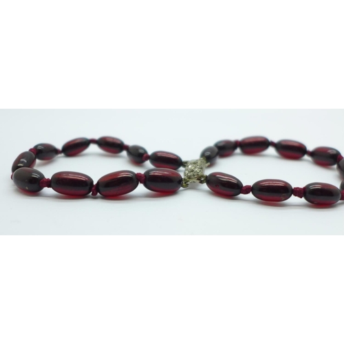 999 - A sherry amber coloured double string bracelet