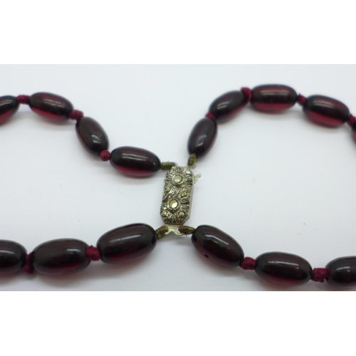 999 - A sherry amber coloured double string bracelet