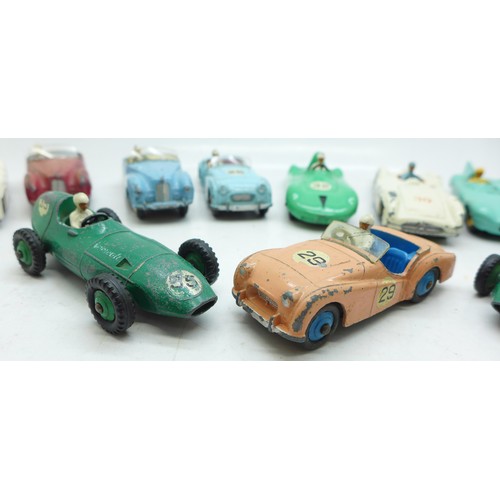 785 - Thirteen Dinky Toys die-cast vehicles and four petrol pumps