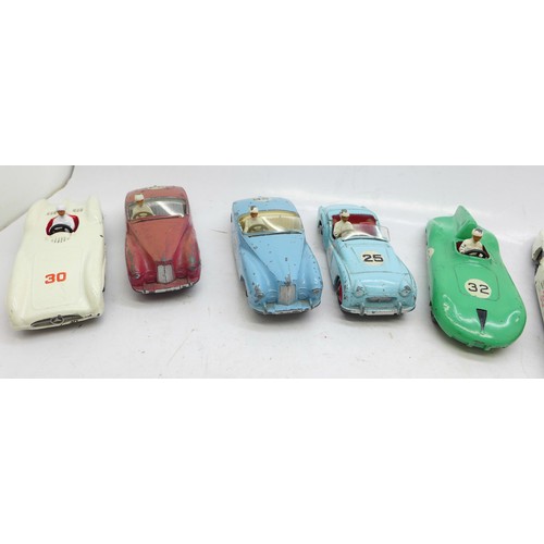 785 - Thirteen Dinky Toys die-cast vehicles and four petrol pumps