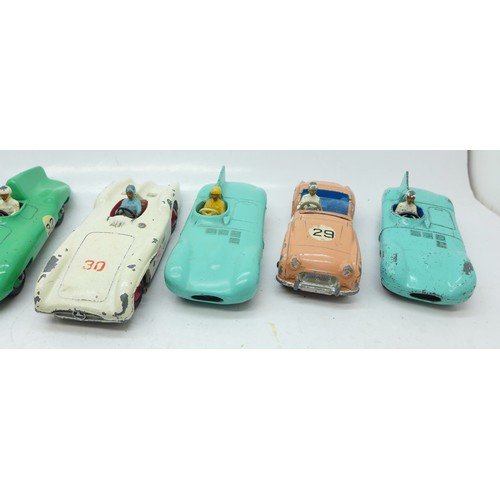 785 - Thirteen Dinky Toys die-cast vehicles and four petrol pumps