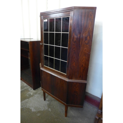 102 - A Danish rosewood freestanding corner cabinet, 139cms h, 85cms w, 54cms d  

*Accompanied by CITES A... 