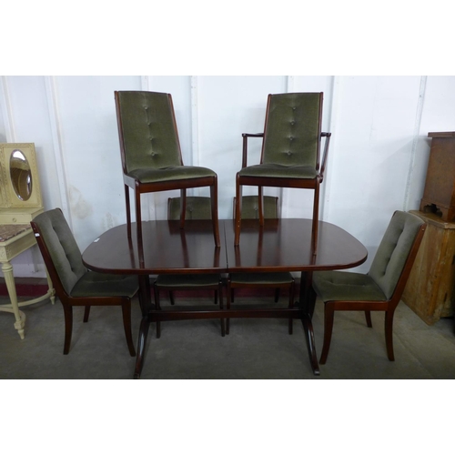 104 - A McIntosh Ambassador range mahogany extending dining table and six dining chairs