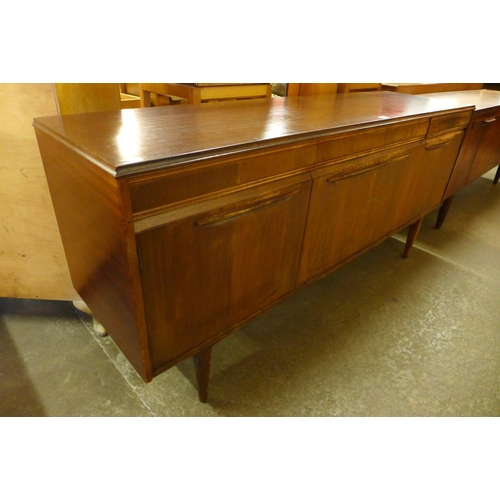 107 - A teak sideboard