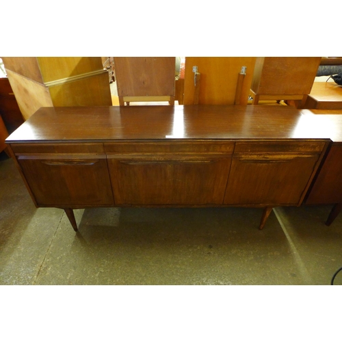 107 - A teak sideboard