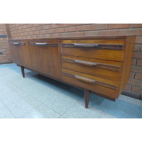 108 - A teak sideboard