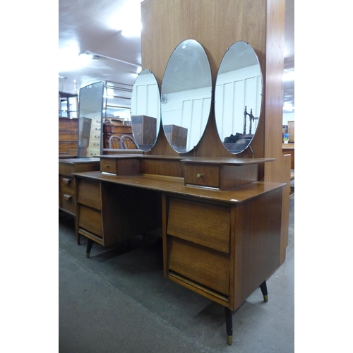 110 - A teak dressing table