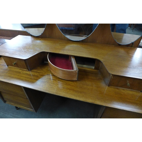 110 - A teak dressing table