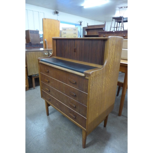 113 - A F.D Welters Ltd. teak tambour writing desk/chest