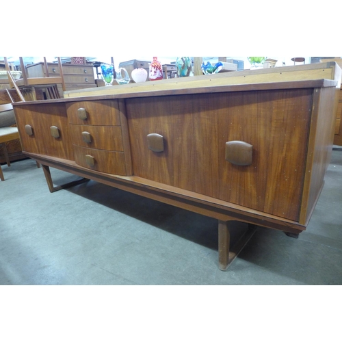 114 - A teak sideboard