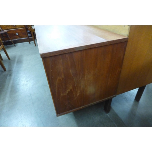 114 - A teak sideboard