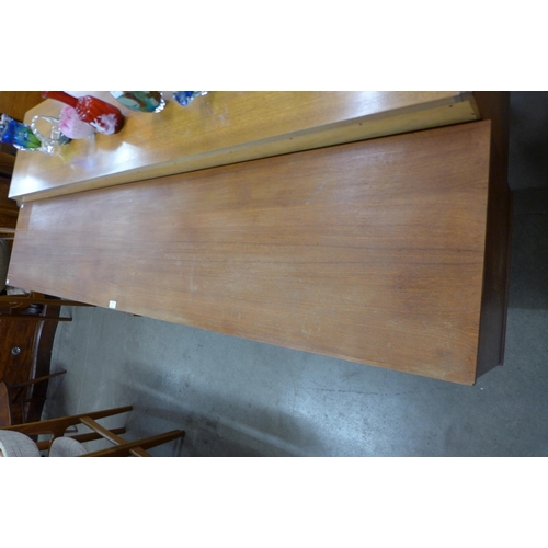 114 - A teak sideboard