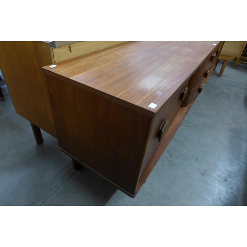 114 - A teak sideboard