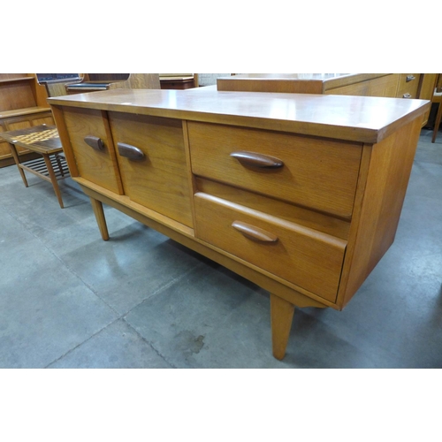 115 - A Jentique teak sideboard