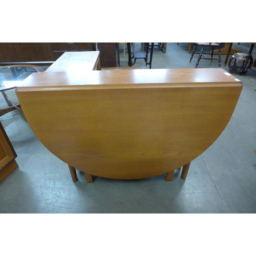 119 - A teak drop-leaf table