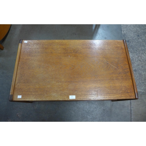 120 - A teak coffee table