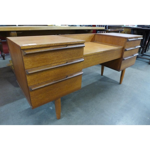 130 - A teak dressing table