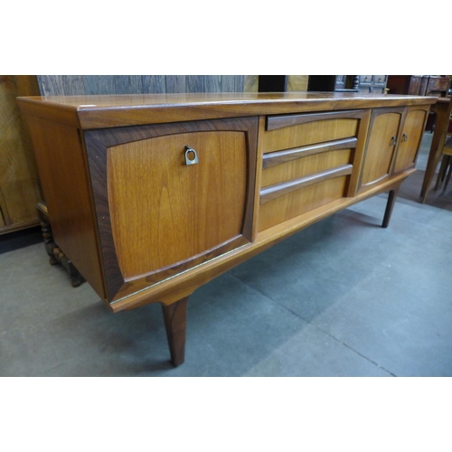 131 - A teak sideboard