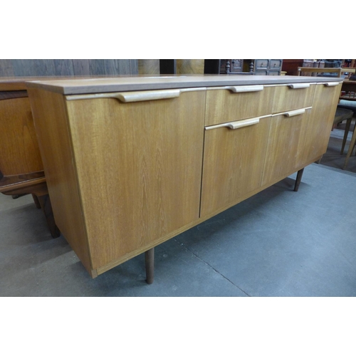 132 - A teak sideboard