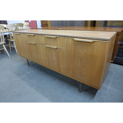 132 - A teak sideboard