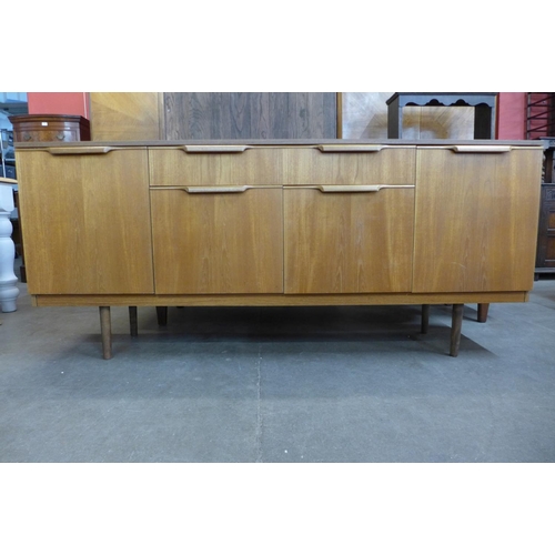 132 - A teak sideboard