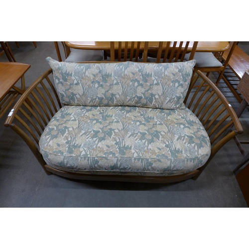 134 - An Ercol Golden Dawn elm settee