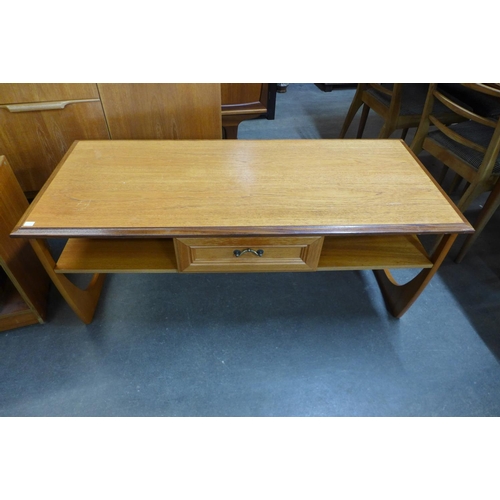 137 - A teak record cabinet and a teak single drawer coffee table