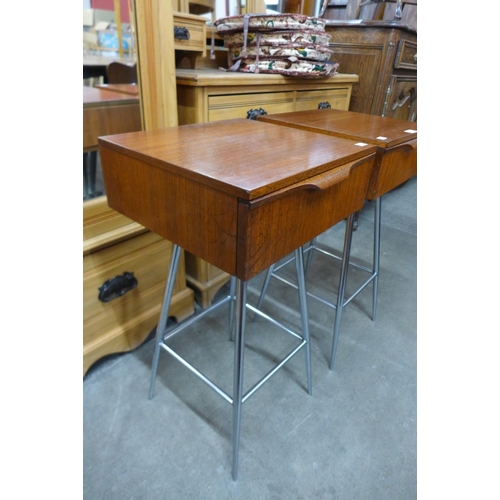 147 - A pair of teak and chrome bedside tables