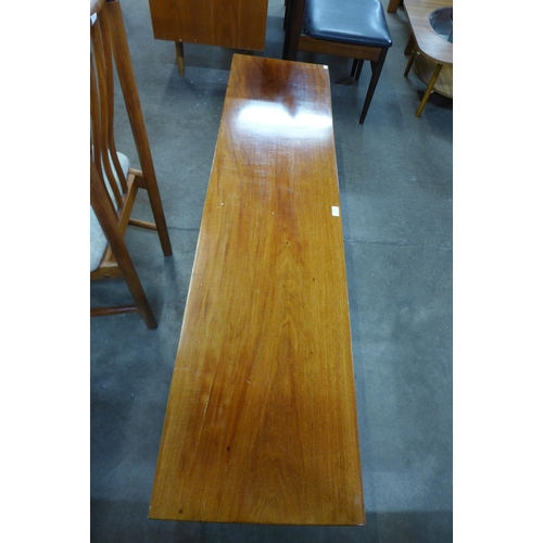 149 - A teak coffee table