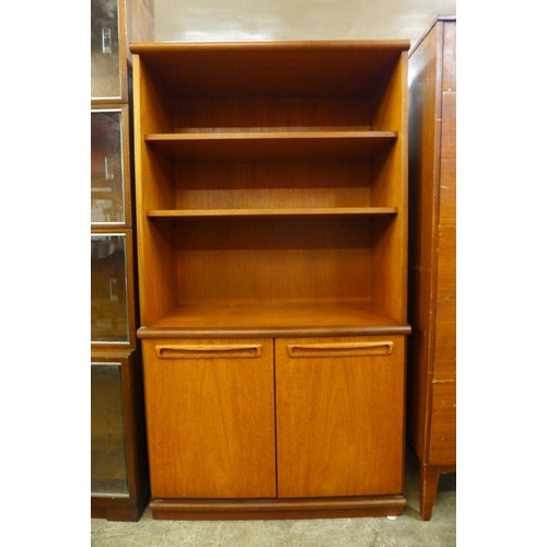 152 - A teak open bookcase