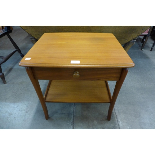 154 - A teak bedside table