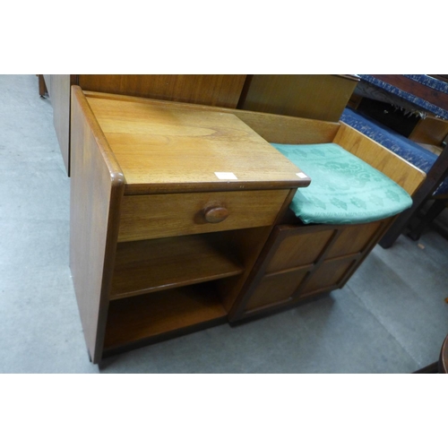 159 - A Nathan teak telephone seat and a teak nest of tables