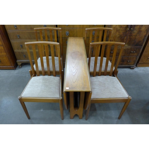 161c - A teak drop-leaf table and four chairs