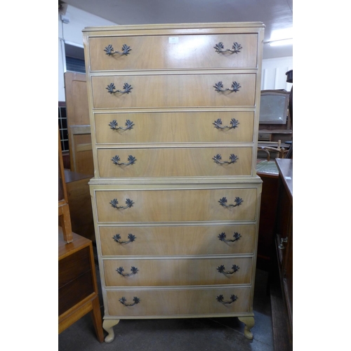 164 - A George III style bleached walnut chest on chest