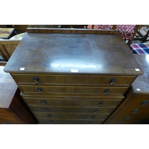 171 - A walnut chest of drawers