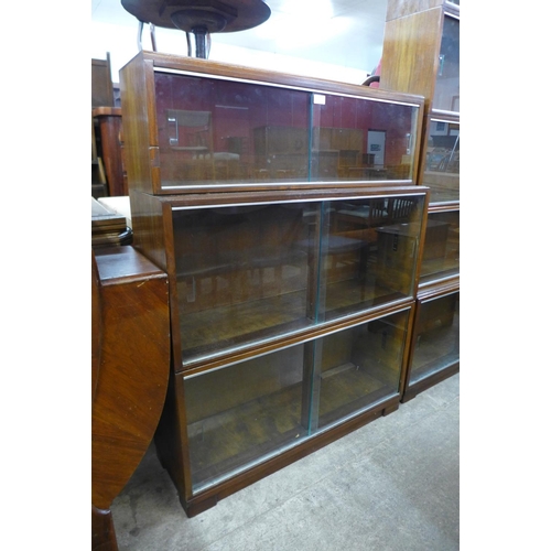 177 - A Minty walnut three tier bookcase