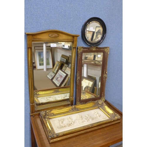 18 - A small gilt framed pier mirror, a faux marble plaque depicting cherubs and two other mirrors