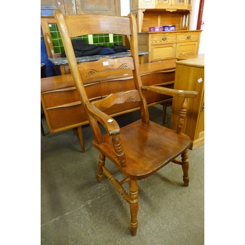 187 - A Victorian elm and beech farmhouse armchair