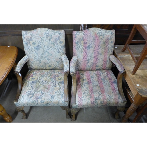 187a - A pair of 1930's carved mahogany and upholstered Gainsborough style open armchairs