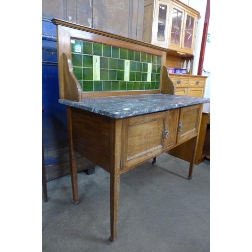 188 - An Edward VII inlaid mahogany and marble topped washstand